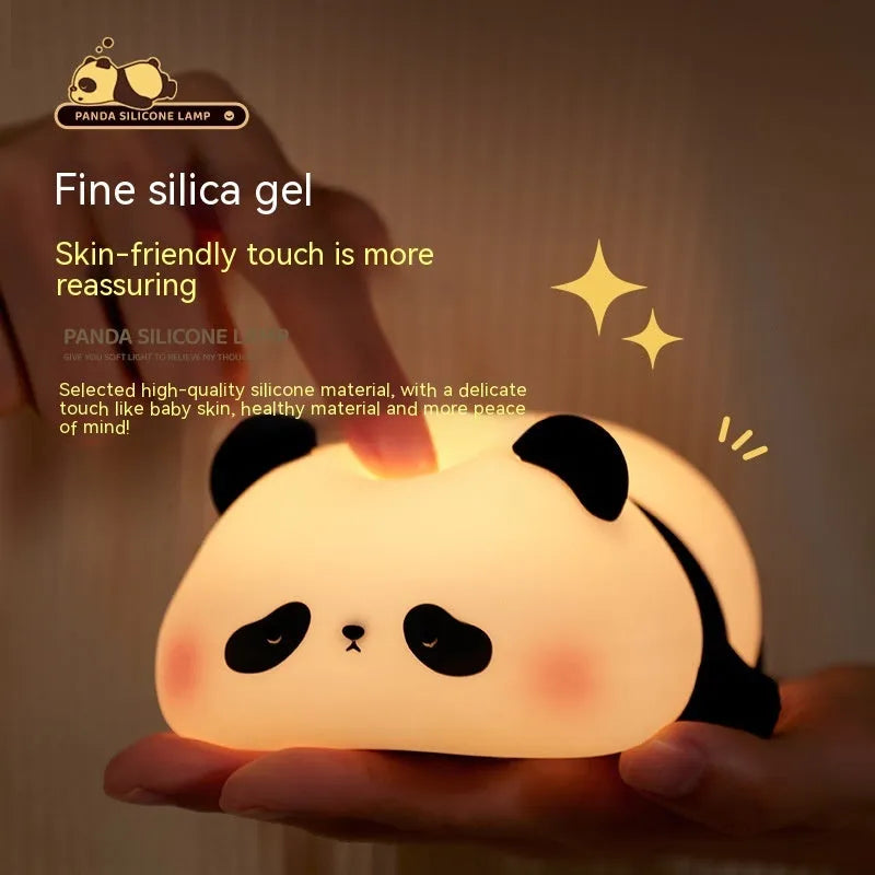 Cartoon panda head rechargeable night light with warm white glow on bedside table