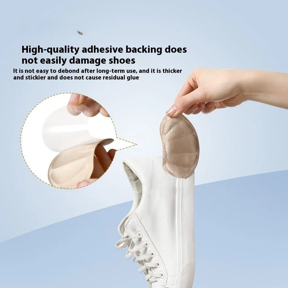 Three pairs of camel suede anti-slip heel cushion pads on a white background.