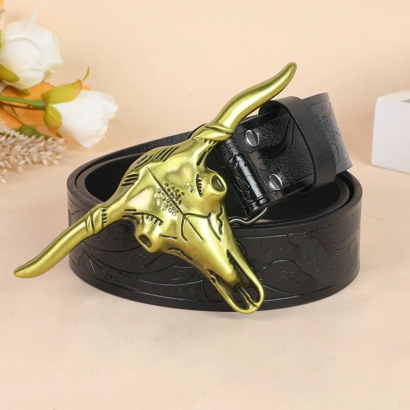 Men's black imitation leather belt with a metallic alloy cow head buckle and pin buckle fastening