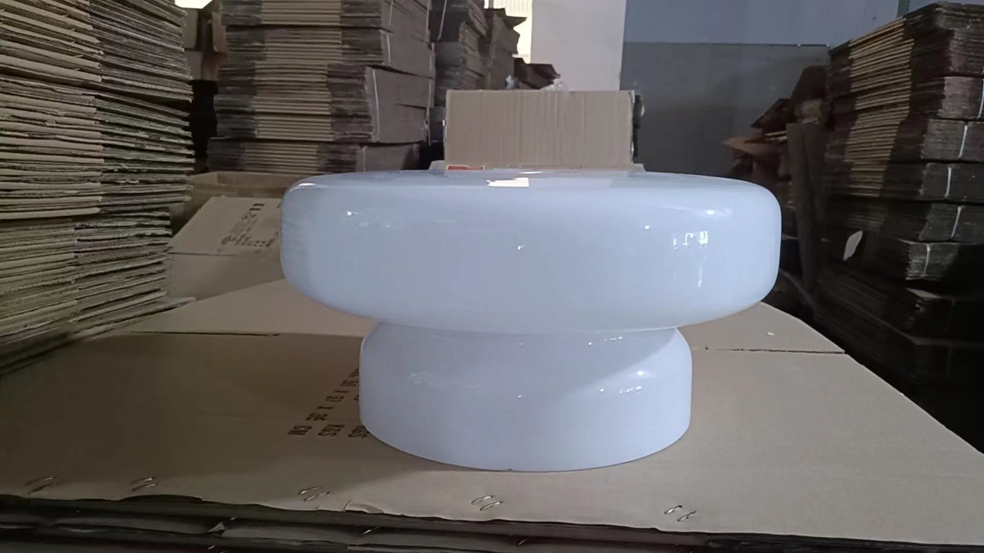 Modern glass chandelier with minimalist design in 36cm dimensions showing light colour options
