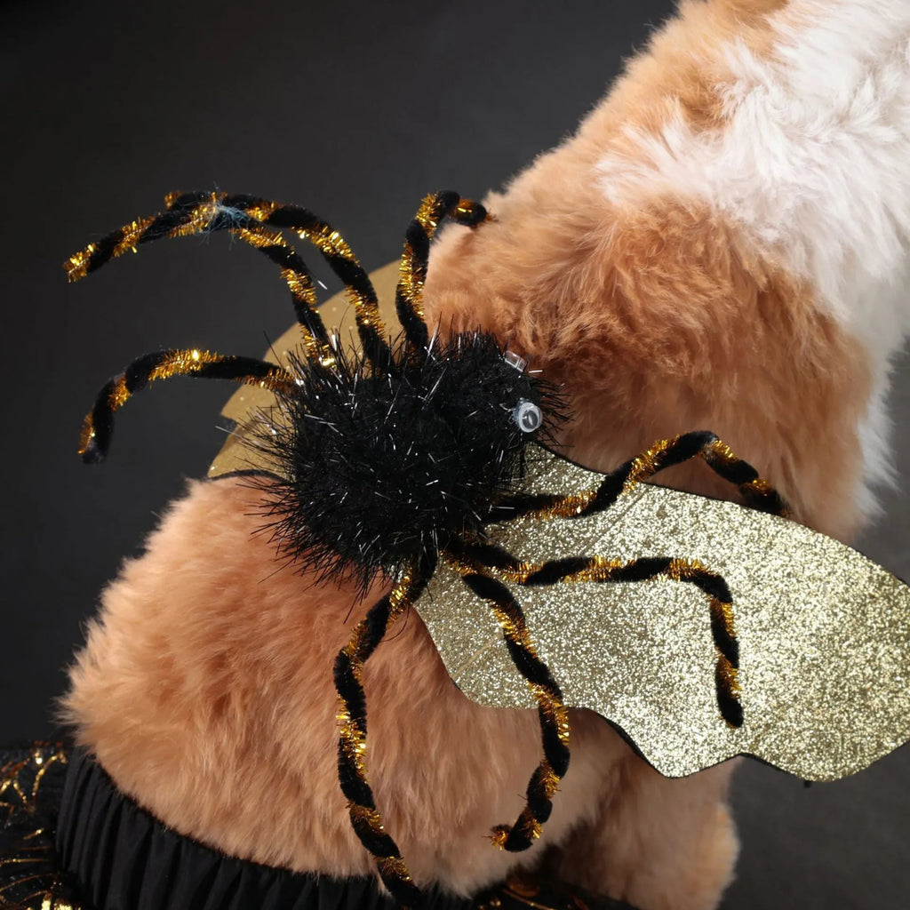 A dog wearing a black and white polyester suit costume for Halloween.