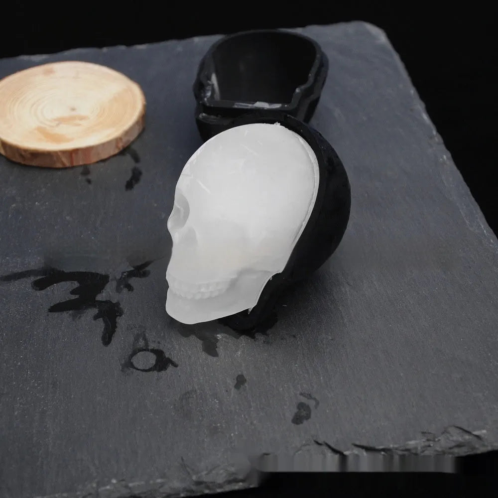 Halloween ice cube tray creating 3D skull-shaped ice moulds from food-grade silicone