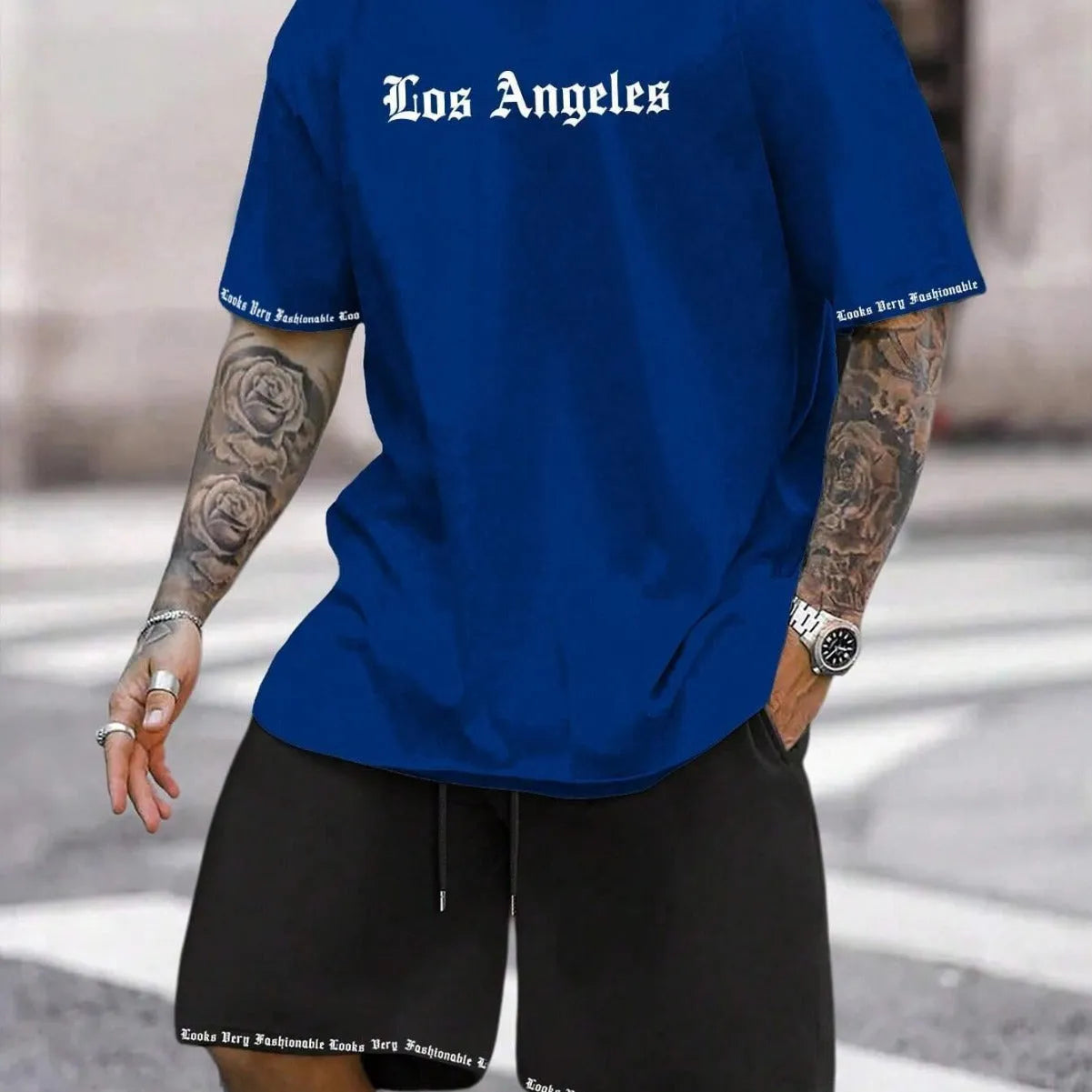 Men's sports style short-sleeved shirt and shorts set in polyester blend fabric