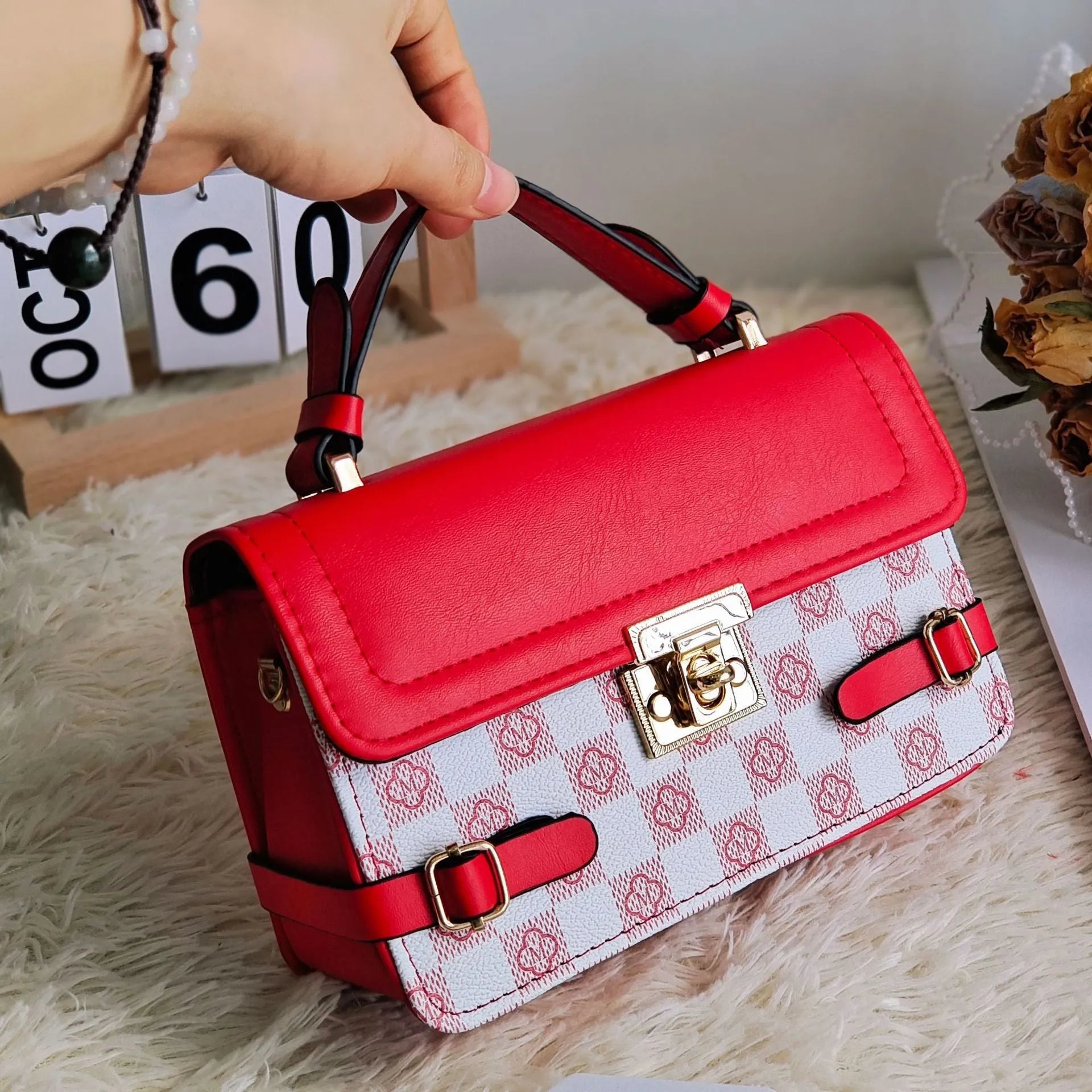 Brown ethnic pattern square crossbody bag with file compartment and structured PU build