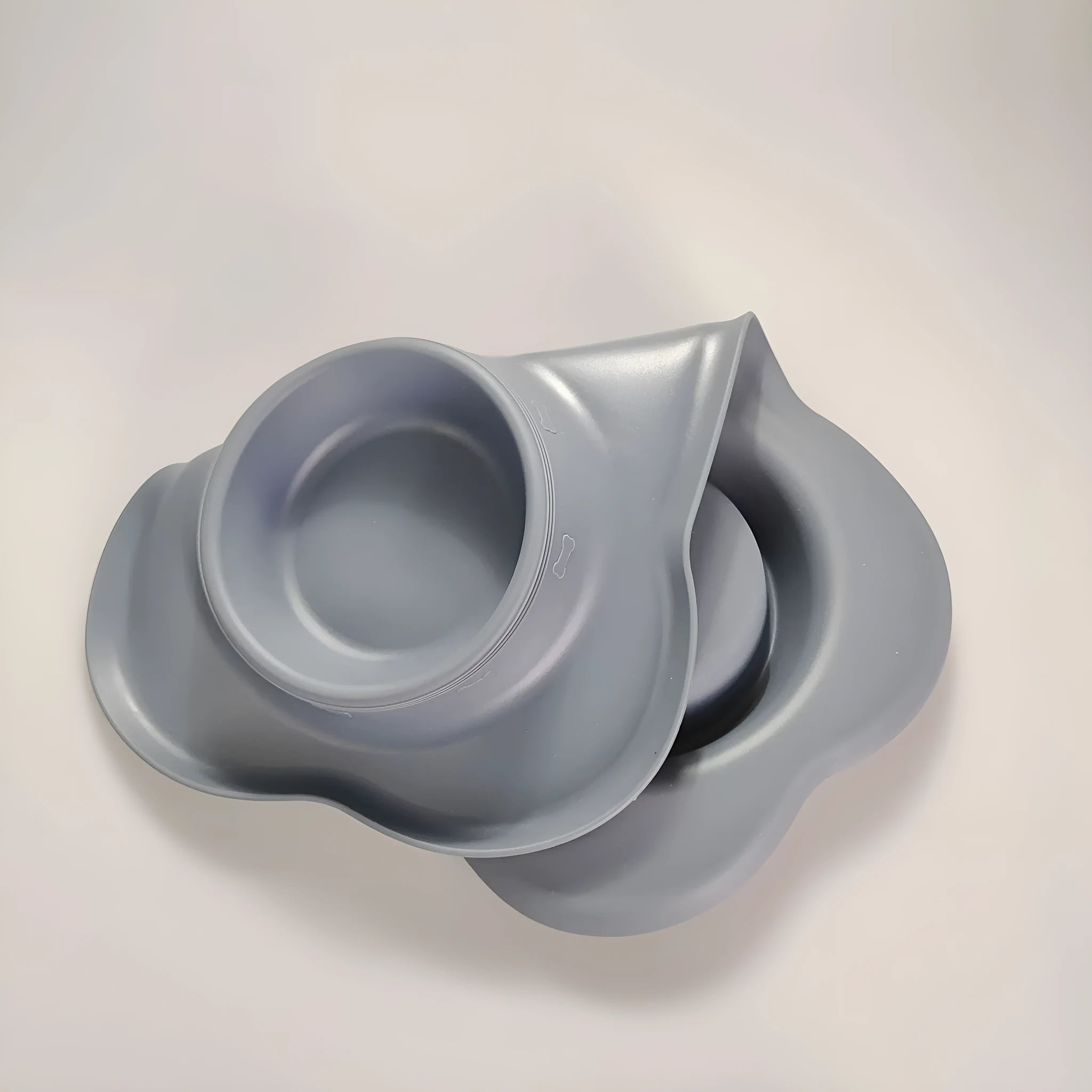 Silicone dog bowl with stainless steel interior in large and small sizes with five colour options