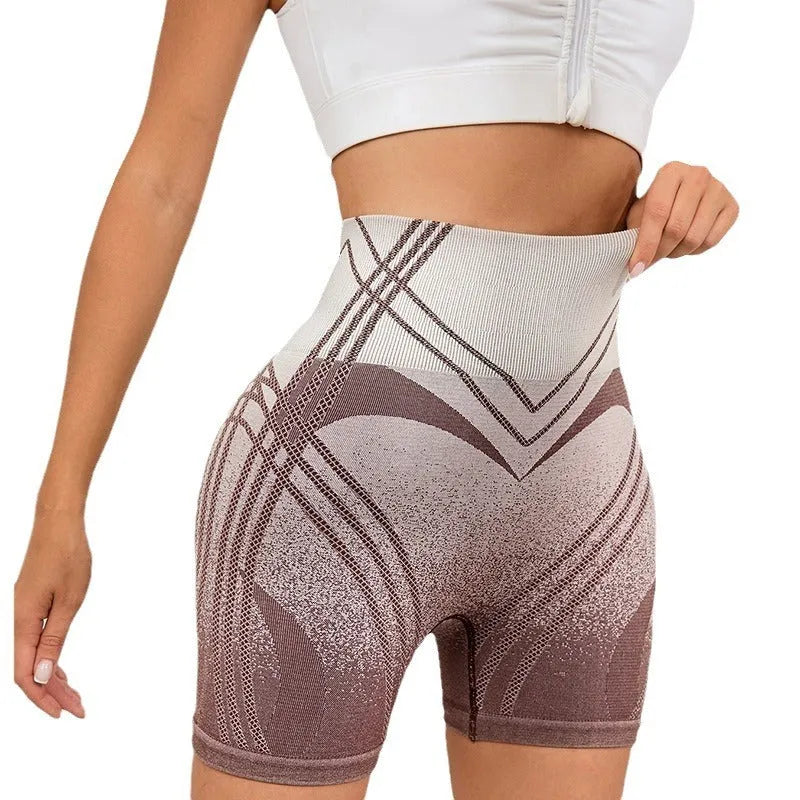Women's gradient high waisted fitness shorts in nylon blend fabric available in brown and black colours