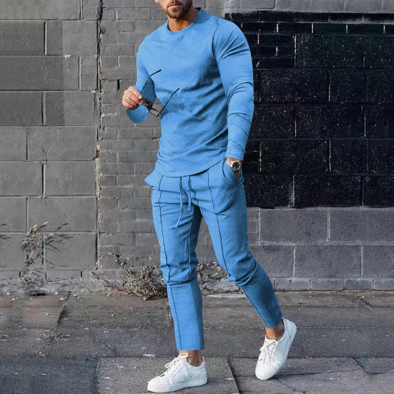 Men's solid colour two-piece polyester tracksuit with long sleeves, shown in apricot colour.