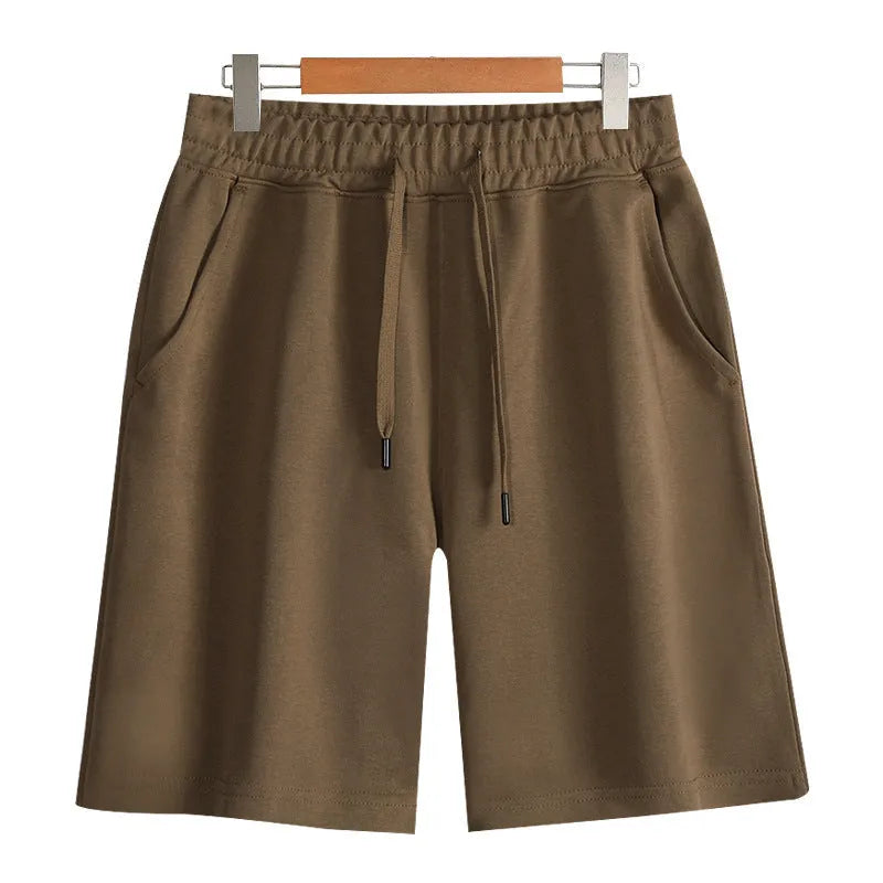 Cotton straight-leg summer shorts in light grey shown on a hanger