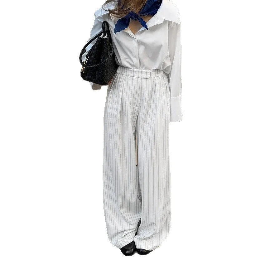 White striped wide-leg casual trousers with zipper detail shown in S/M/L sizes for commuting wear