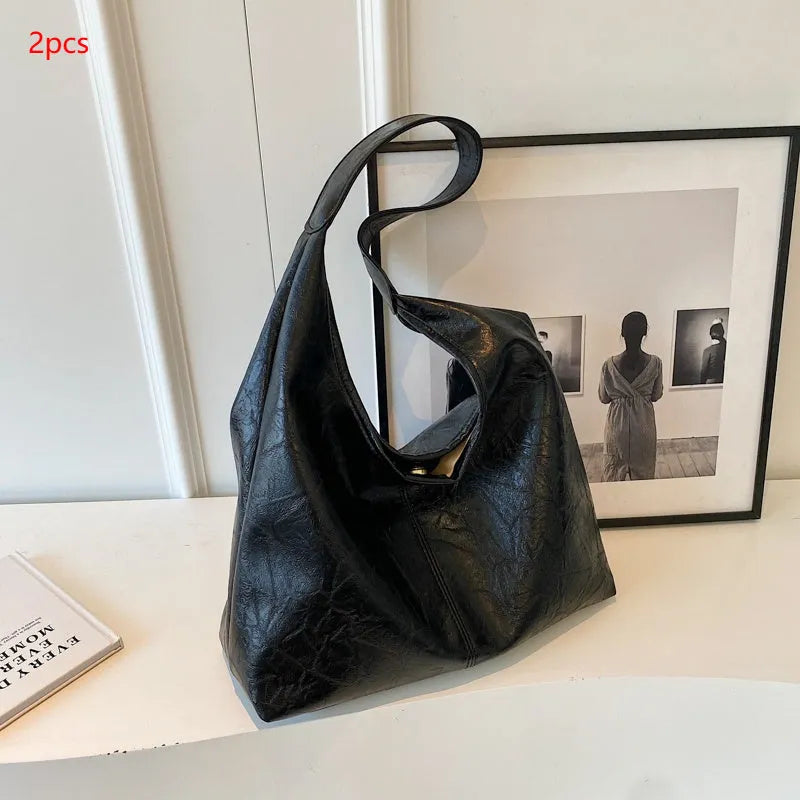Soft PU leather casual shoulder bag with large capacity and street style design
