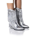 Women's black chunky heel tassel boots with a pointed toe and high stiletto heel.
