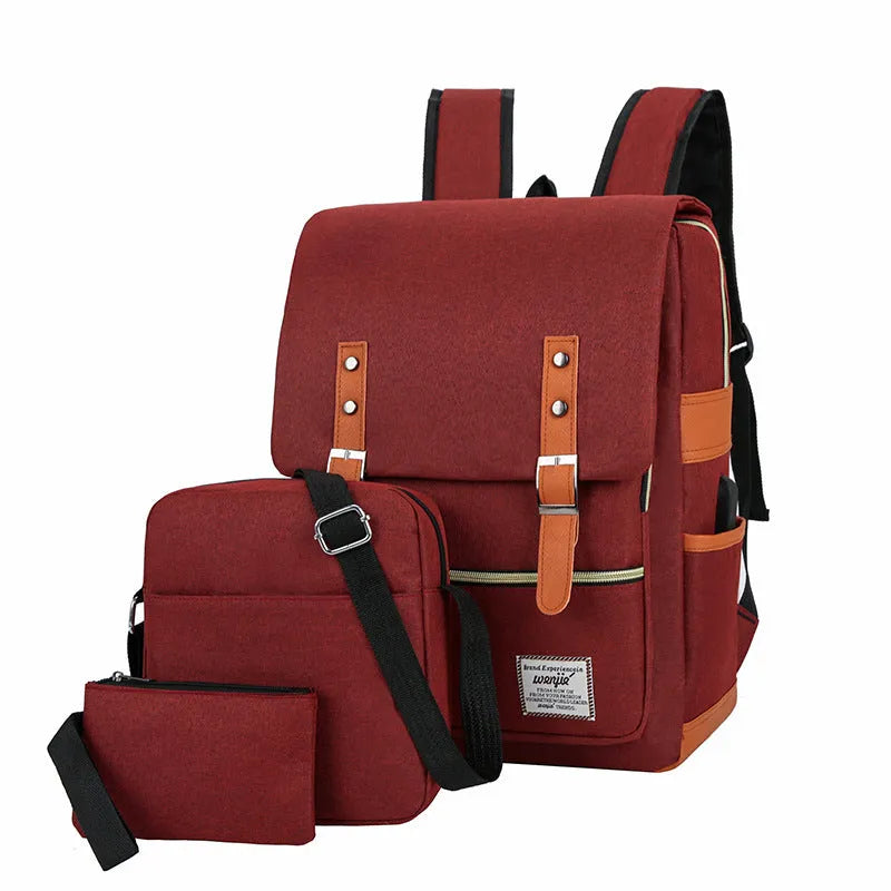 Three-piece business backpack in wine red with curved shoulder straps and multiple compartments