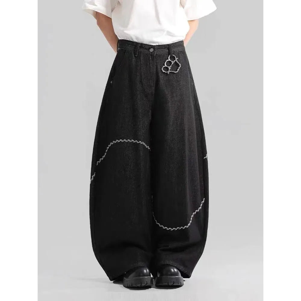 Black straight leg trousers with micro-elastic denim fabric and zip fly opening