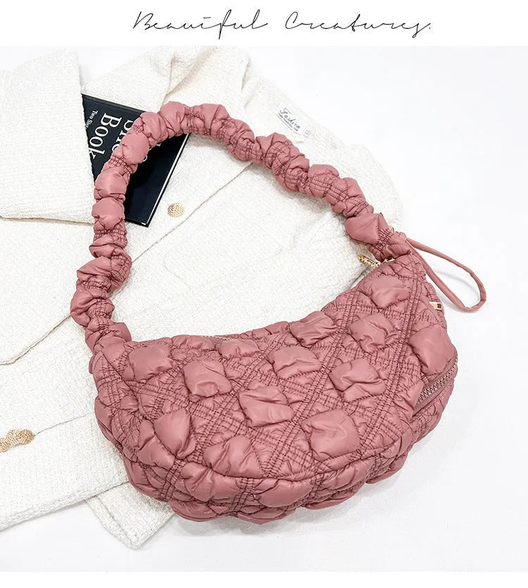 Women's nylon shoulder messenger bag in a solid colour with a long strap, showing front view.