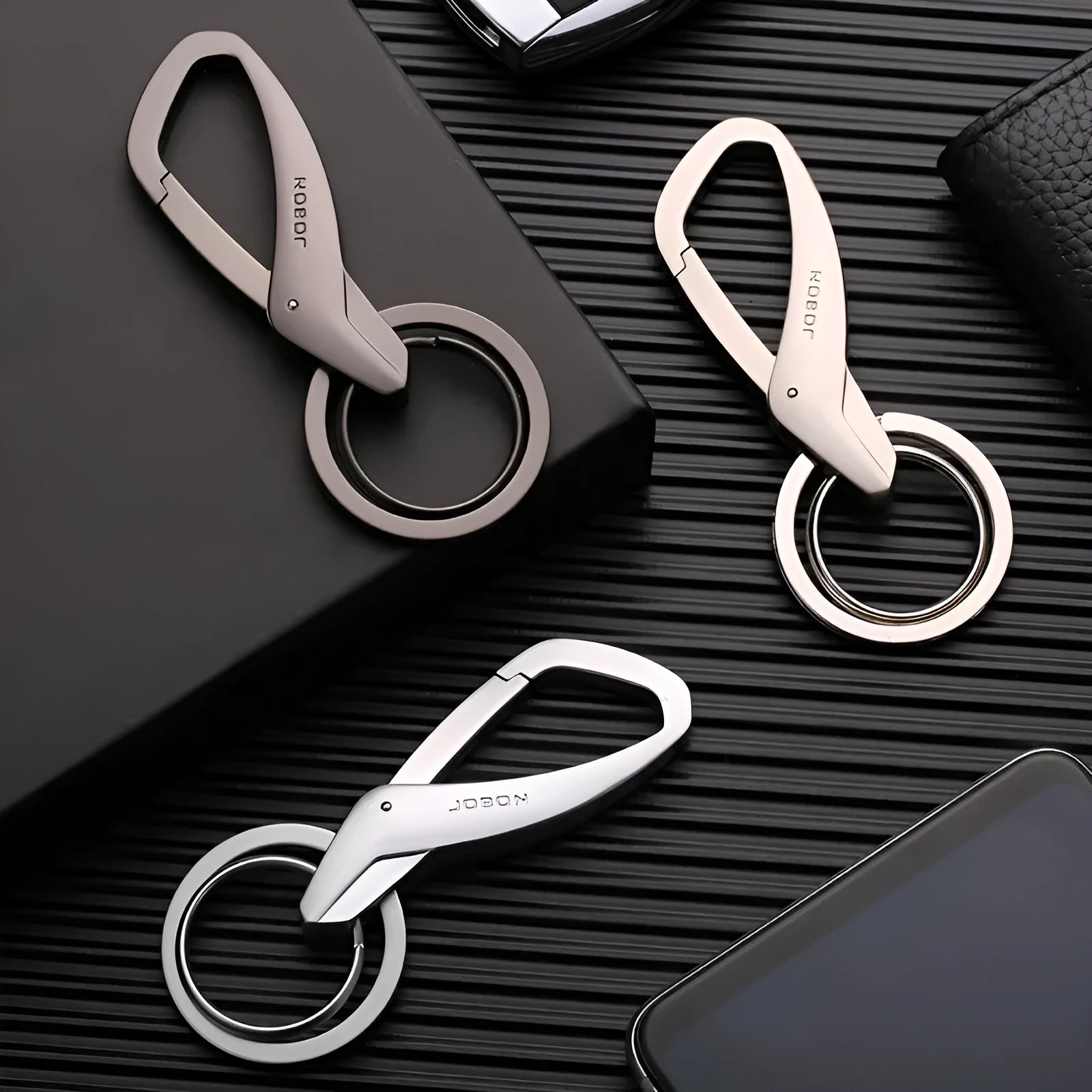 Zinc alloy double ring keychain in black, chrome or nickel colour showing 8.3cm by 3.5cm size