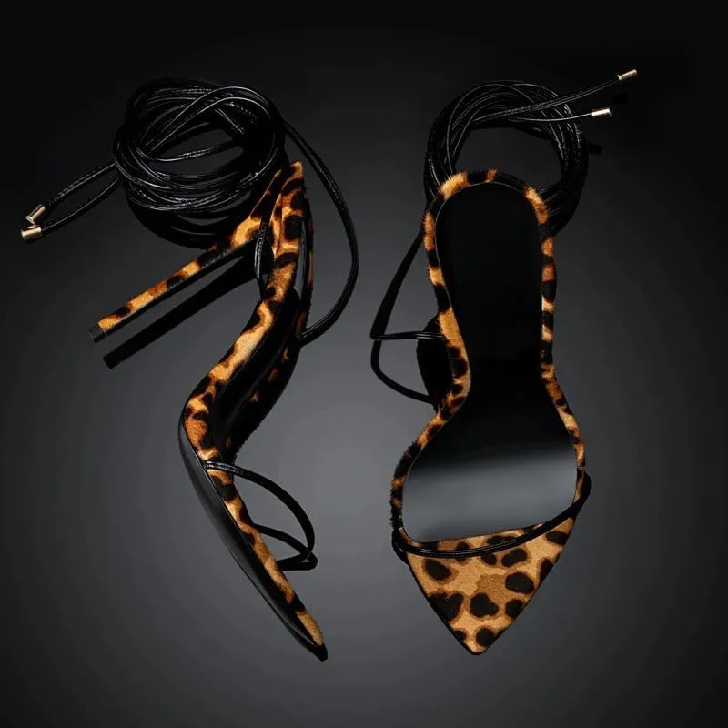 Women's leopard print pointed toe sandals with Roman lace-up ankle strap and buckle closure