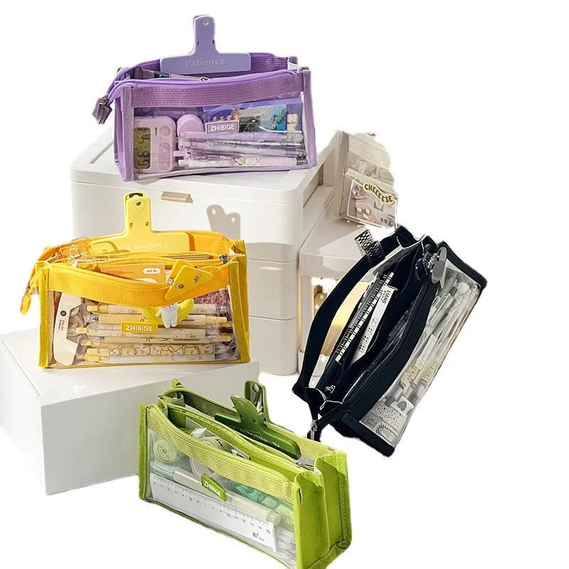 Large capacity transparent pen bag in non-woven fabric measuring 200x80x100mm holding pens with five colour options