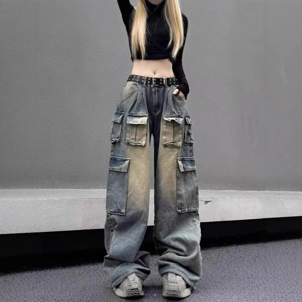 Men's loose fit distressed denim jeans with multiple pockets in street hipster style