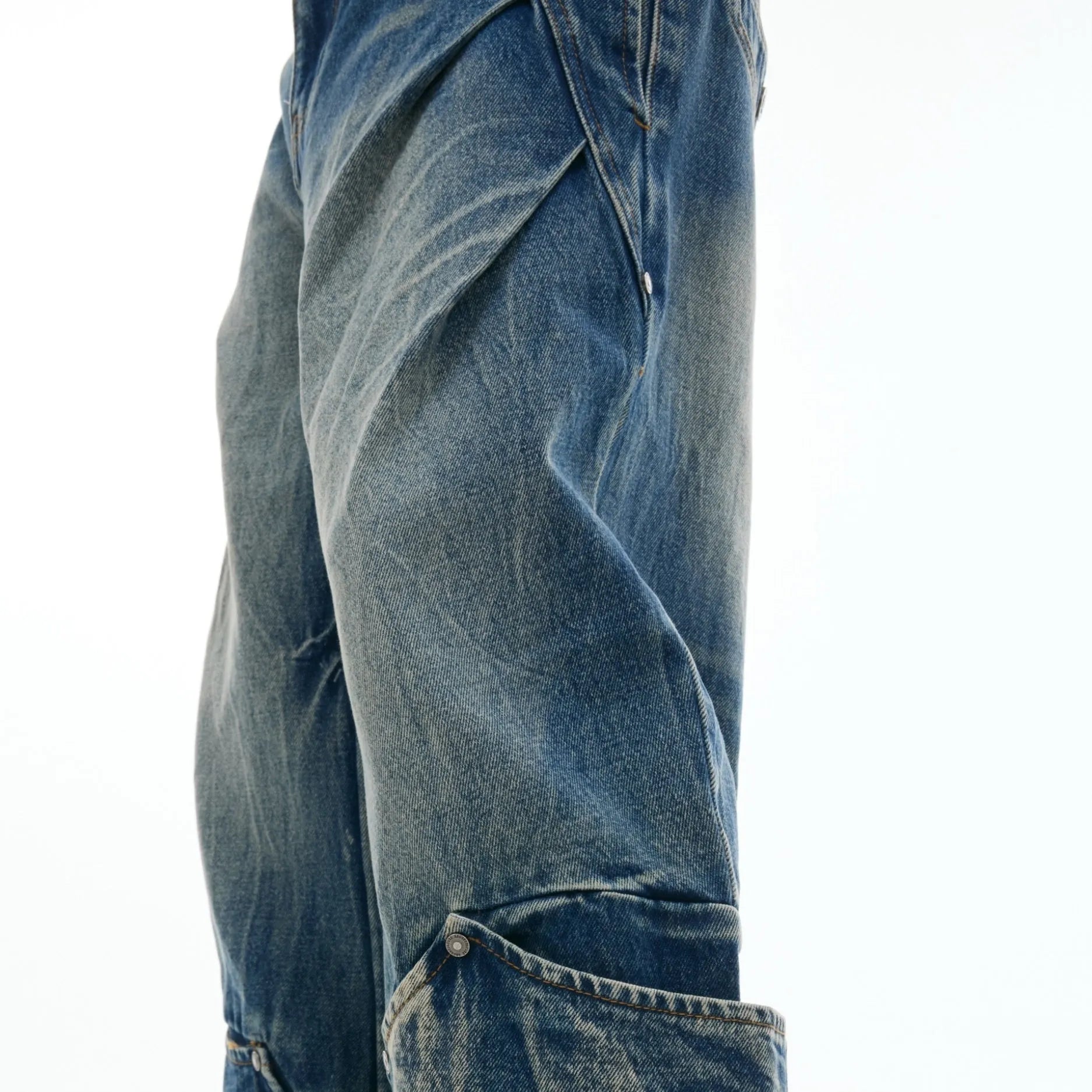 Men's retro washed burst pattern jeans with curved knife details in verdant blue colour