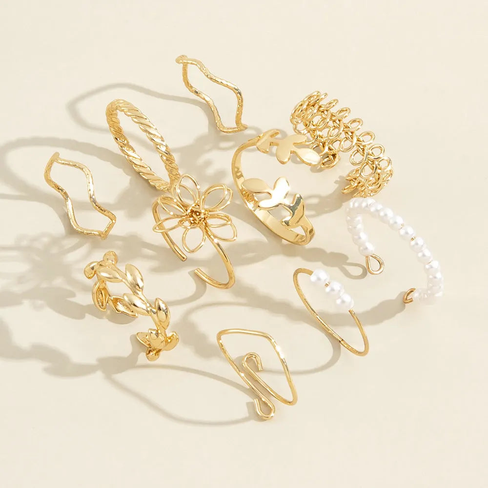 Women's openwork flower ring in electroplated alloy with gold J0656 colour and glossy finish