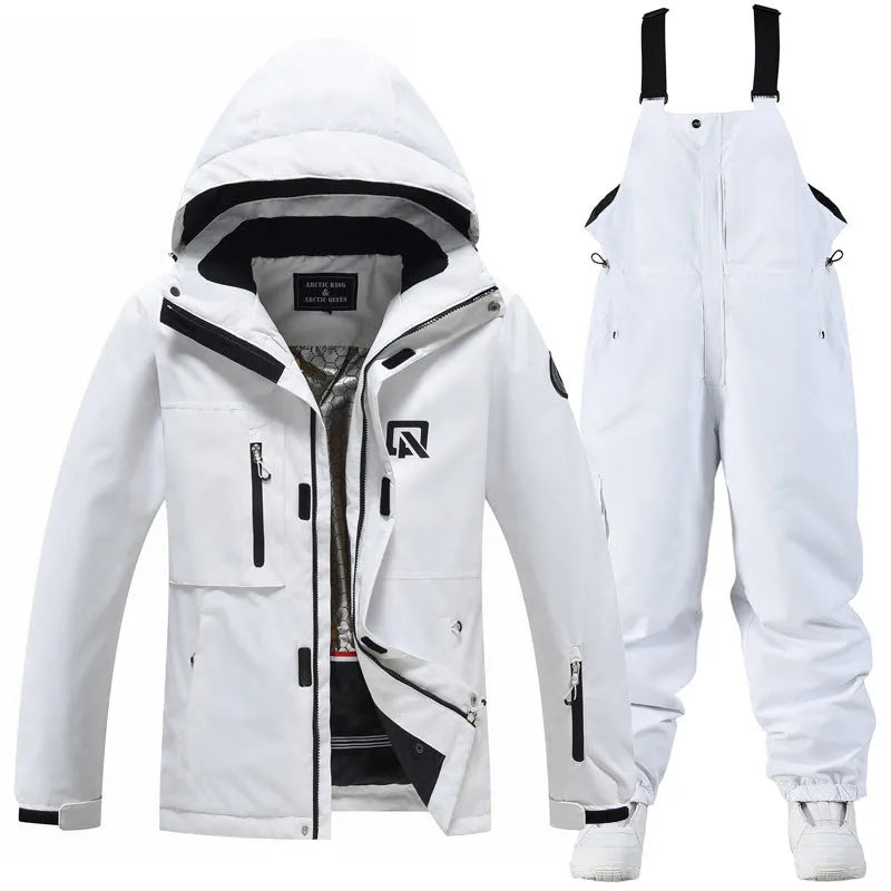 Men's and women's waterproof winter ski suit in blue top with grey blue trousers.