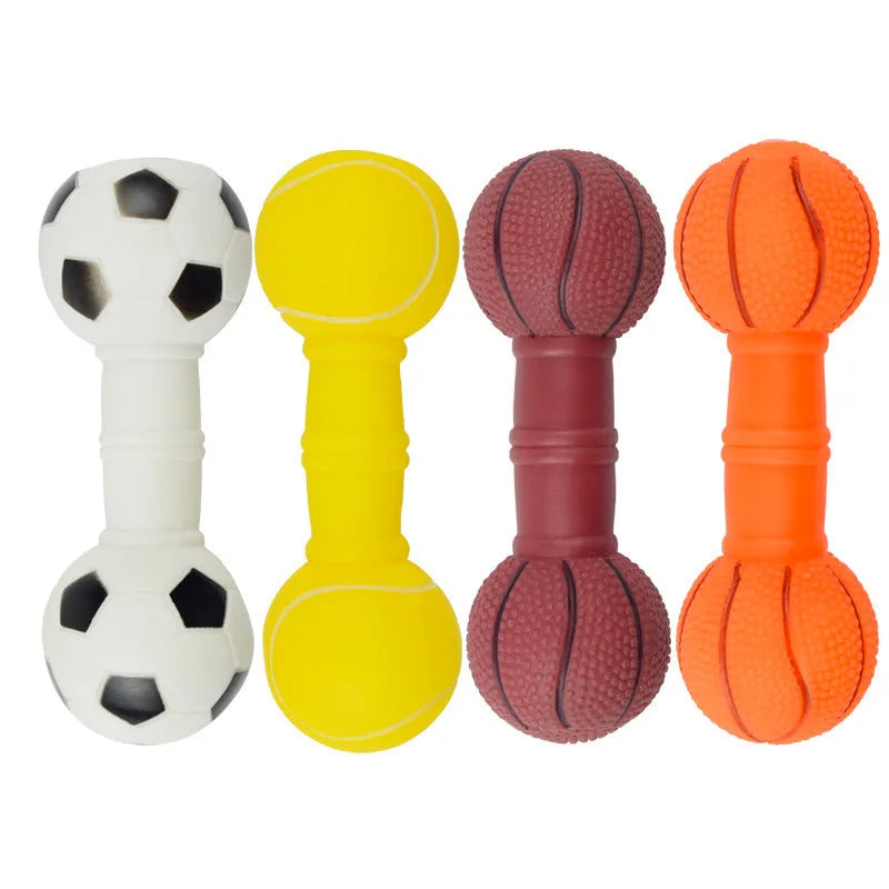 Brown orange white yellow PVC football dumbbell shaped squeaky dog chew toy on a plain background.