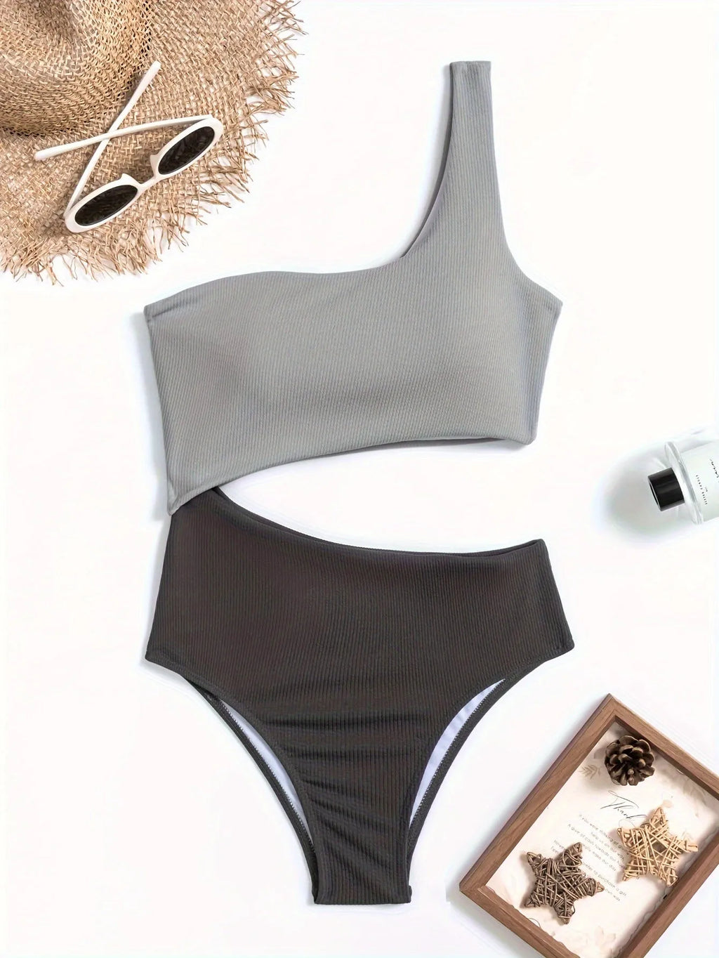 Women's light grey one-shoulder one-piece swimsuit made from polyester fabric