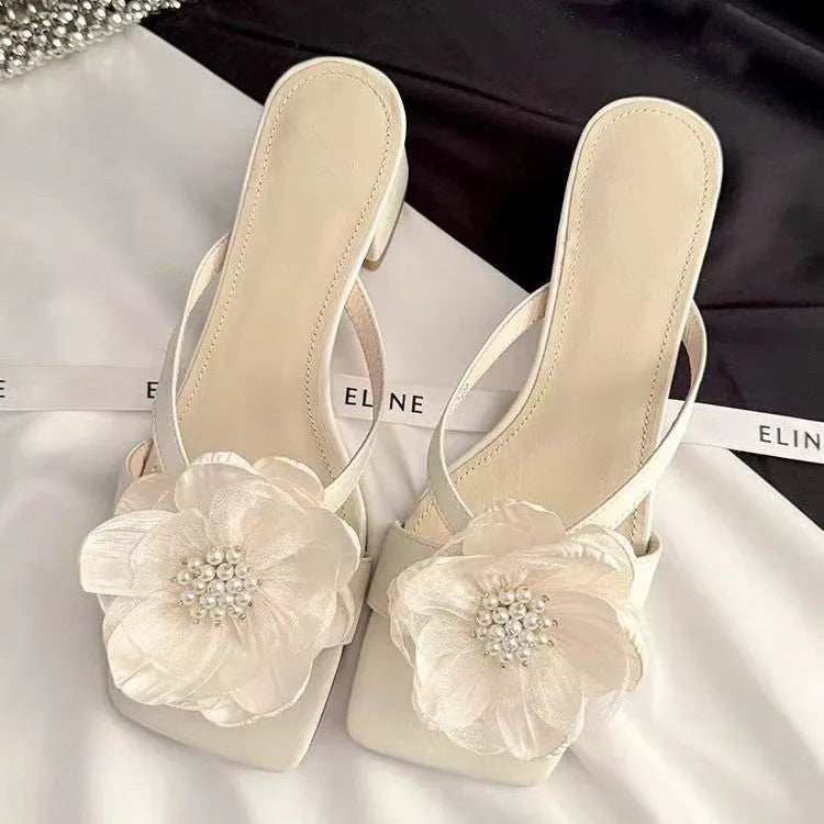 Korean-style women's sandals with chunky heel, square toe, satin upper with floral details in cream-white colour