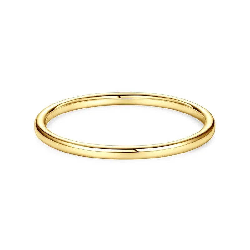 Minimalist geometric bracelet ring in sterling silver, gold, or platinum on a plain background.
