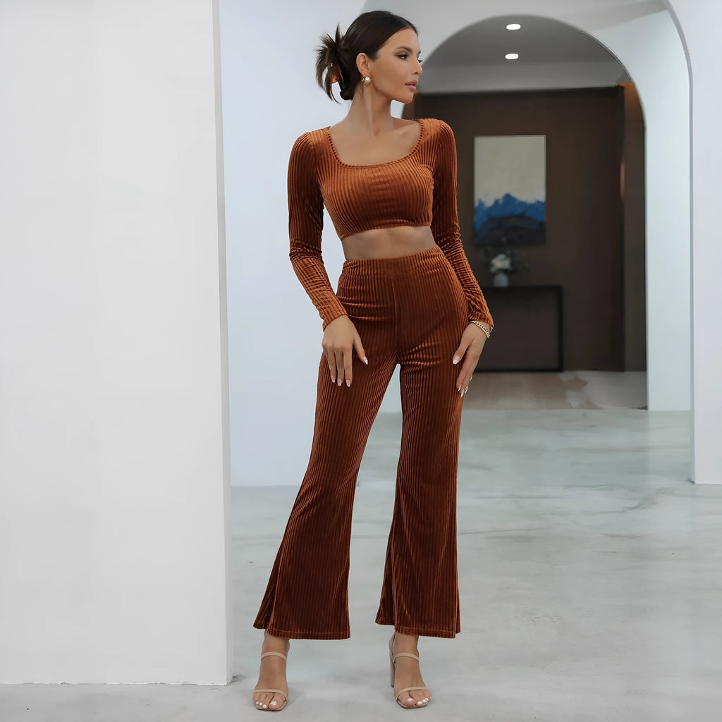 Caramel coloured long sleeve sweater and trousers casual set laid flat.