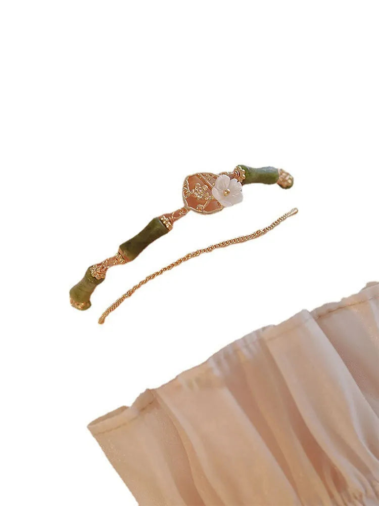 Natural olivine bracelet with double layer twin bells of Ireland design and olive branch elements