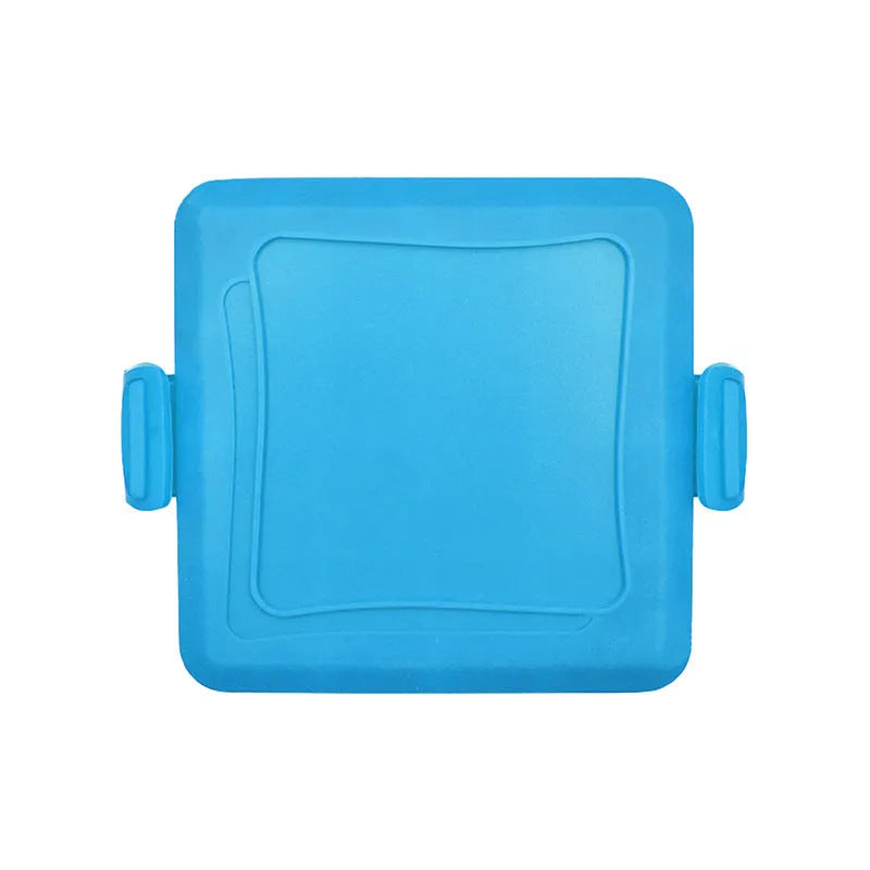 Red silicone baking tray with hand clamp attachment showing anti-scald design