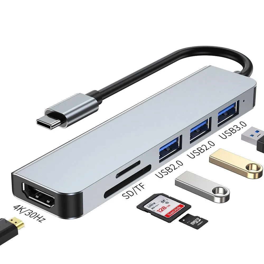 Compact aluminium USB-C expansion dock for laptop and tablet showing multiple port options.