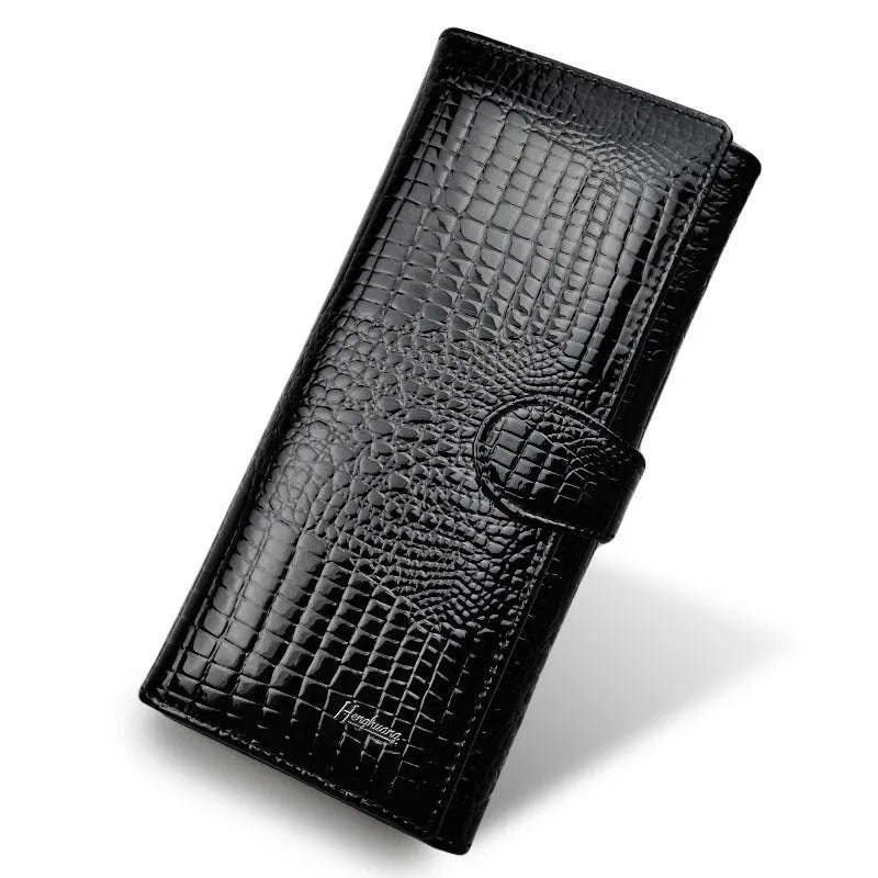 Genuine leather coin purse with patent finish and crocodile pattern in wine red colour