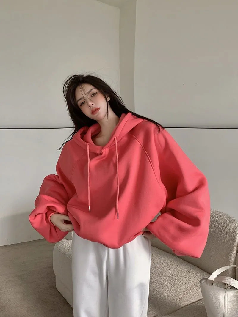 Watermelon red women's sleeveless hooded pullover sweater made from mulberry silk fabric.