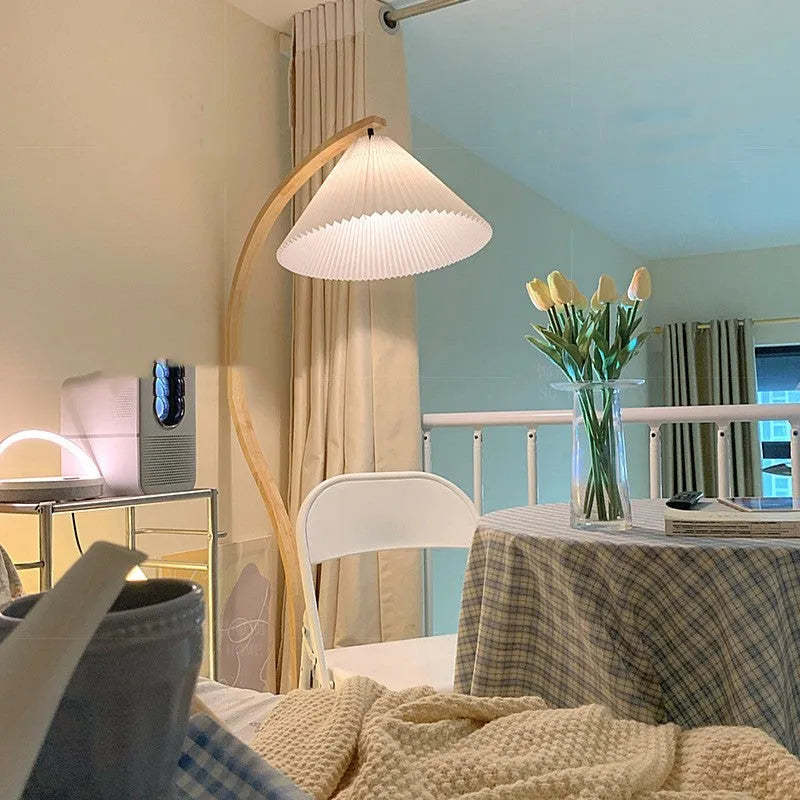 Retro vertical table lamp with fabric shade in white or red, showing three-colour light settings.