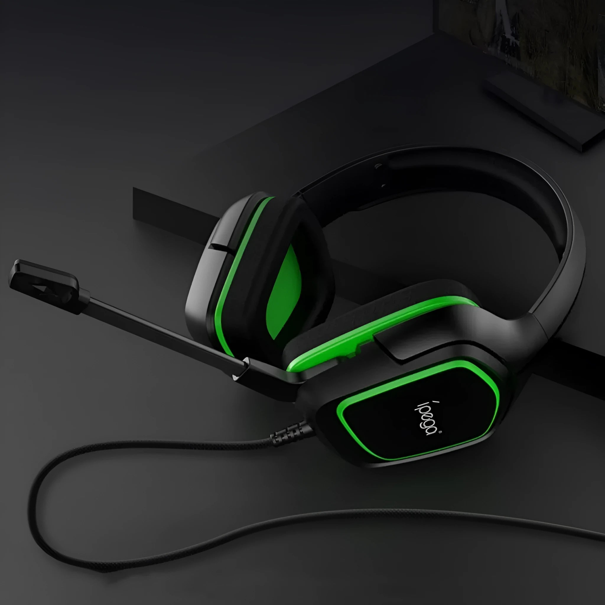 Blue computer gaming headset with microphone, 3.5mm wired cable, and over-ear design