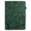 Black imitation leather tablet case with Pachira macrocarpa engraving and built-in viewing bracket open.