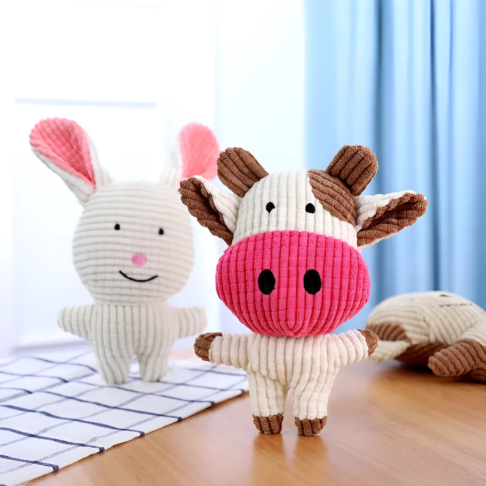Animal-shaped plush dog chew toy in bright colours with squeaker for small medium dogs
