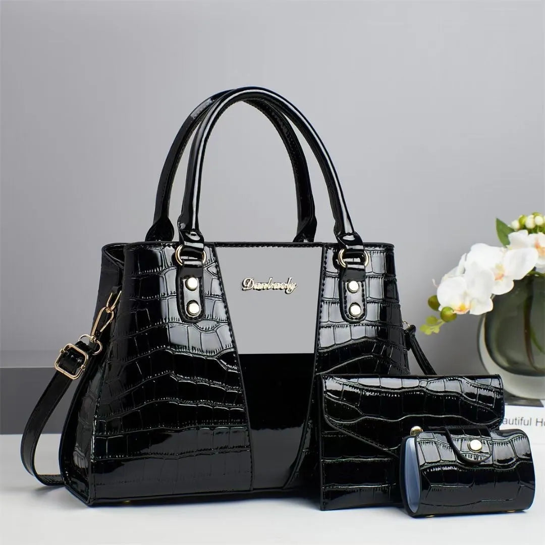 Women's crocodile stitch three-piece shoulder bag set in PU leather showing main bag and two smaller bags
