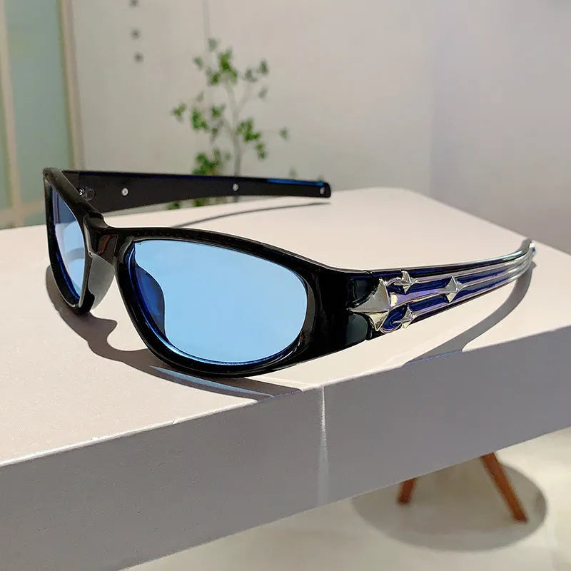 A pair of outdoor sports sunglasses with a PC frame and lens, shown in a black frame with grey lens colour variant.