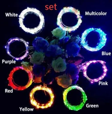 Copper wire LED string light with 20 bulbs and a white plastic bottle stopper for decoration.