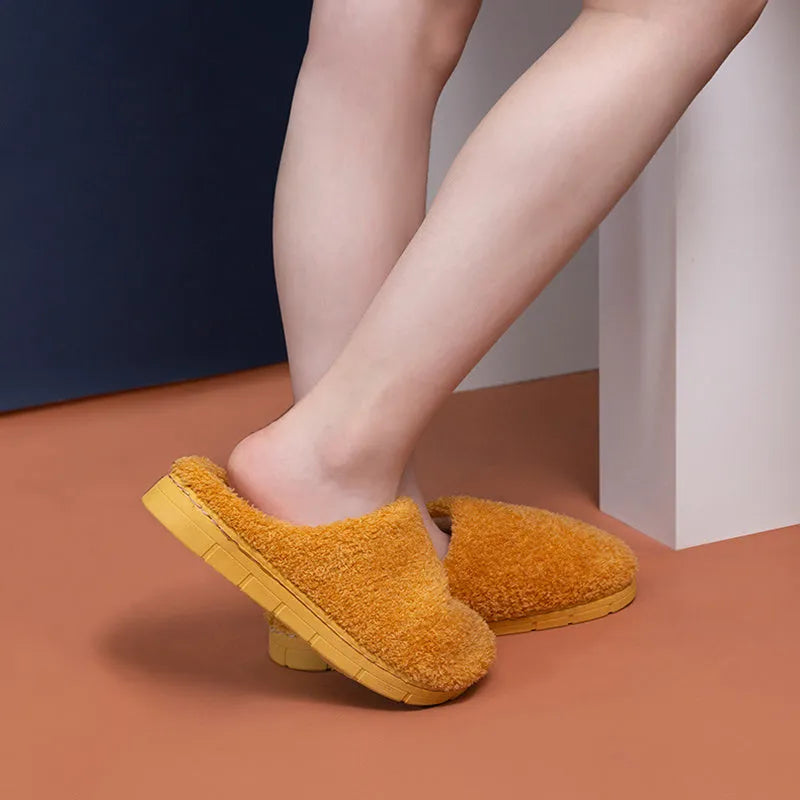 Women’s furry slippers with suede upper and non-slip sole in candy colours for winter home wear