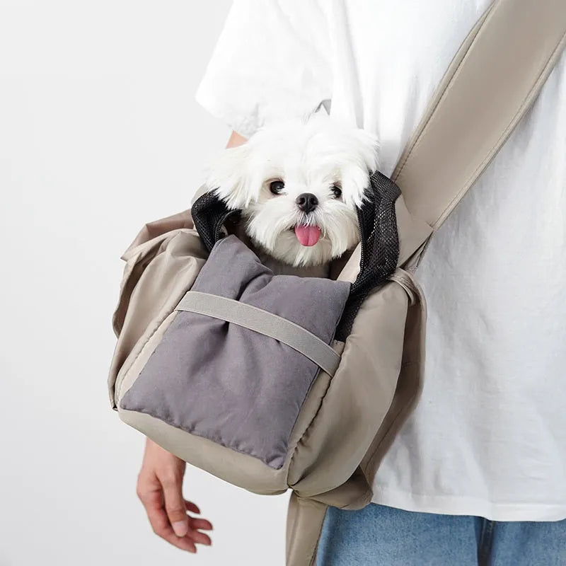 Apricot pet carrier bag with adjustable shoulder strap and side ventilation panels