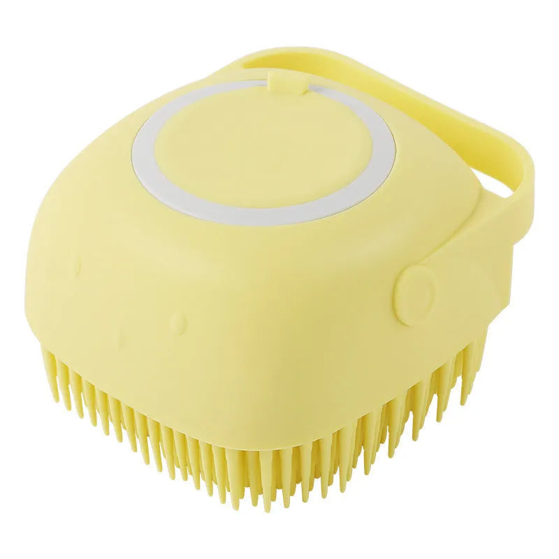 Blue silicone dog bath brush with handle for pet washing and massage during grooming