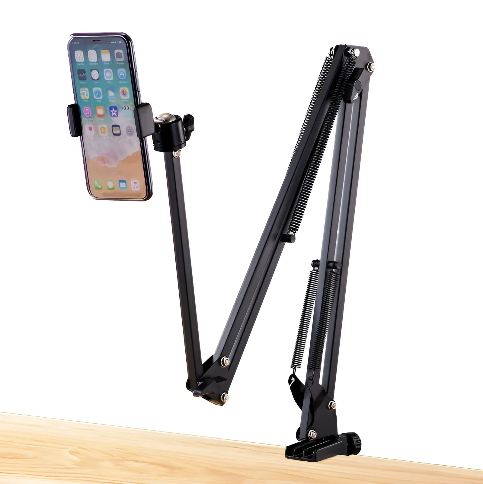 Black foldable metal cantilever bracket holding a tablet, extended on a desktop.