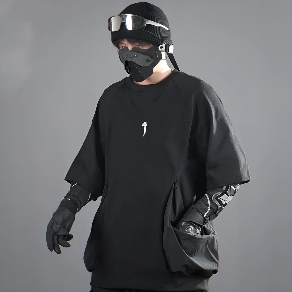 Men's loose fit grey cotton t-shirt with big chest pockets, short sleeves, and a round neck.