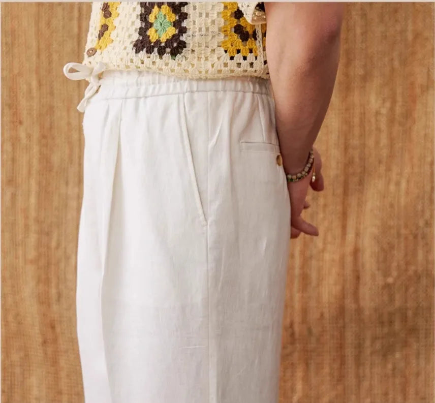 Linen high waist trousers with elasticated waistband in straight-leg cut