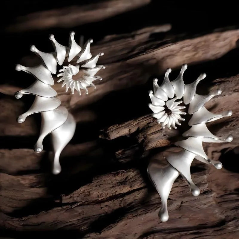 Matte finish conch shell ear studs with three-dimensional design and irregular edges