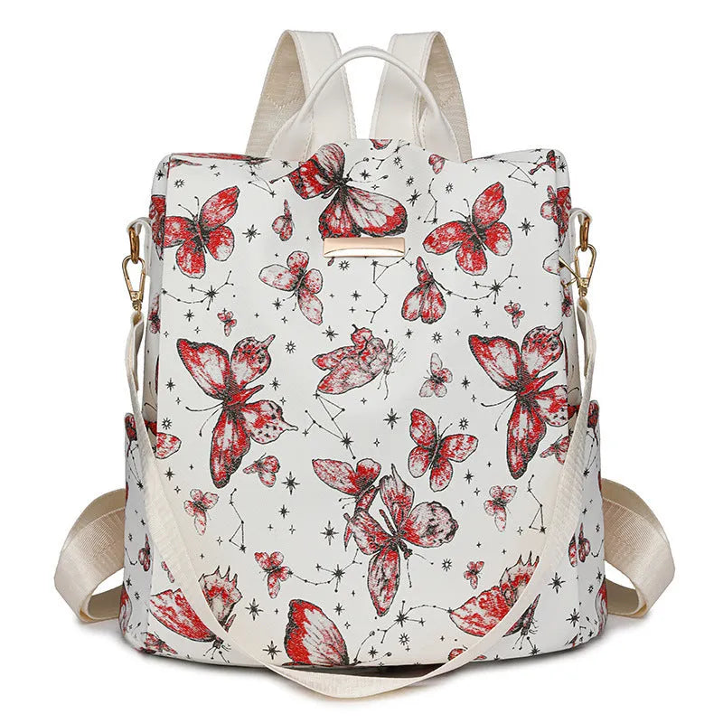 Butterfly printed PU backpack in multiple colours showing sewing line detail and curved backplate